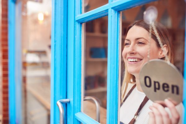 Woman opening her store