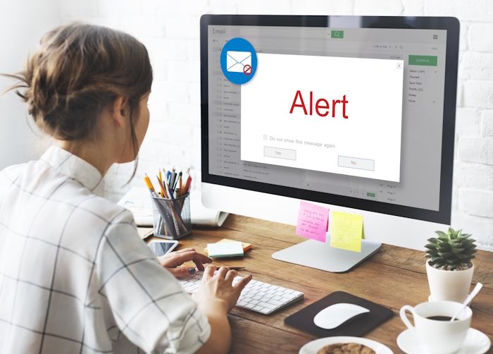 email alert popping up on a laptop screen