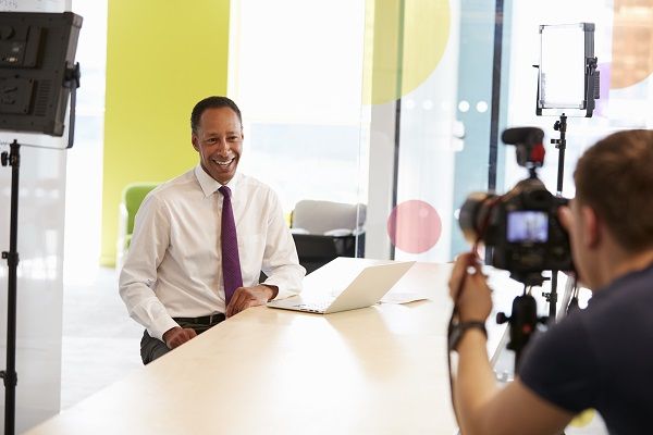 man filming video storytelling content